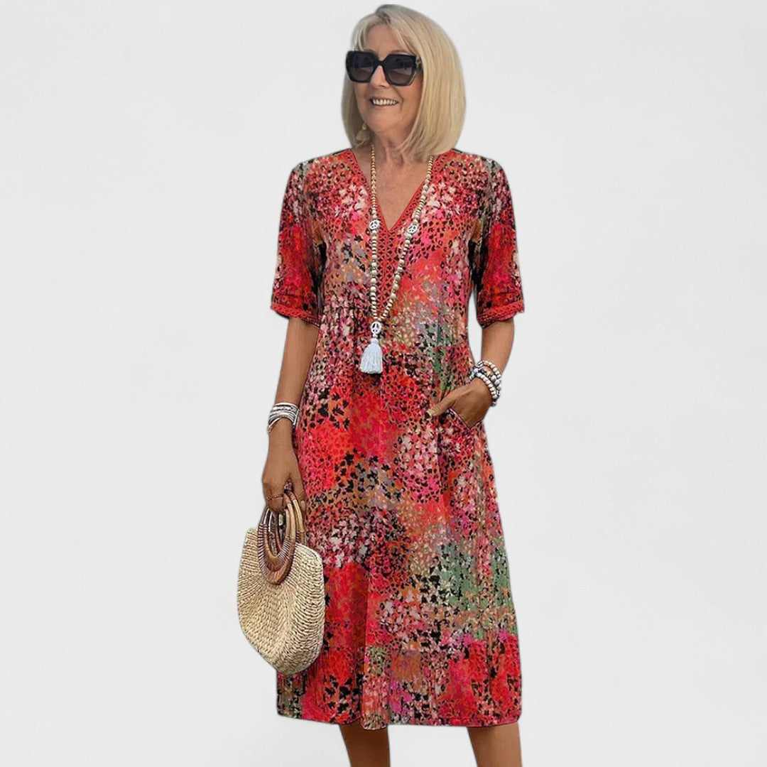 Colette - Vibracijos midi suknelė