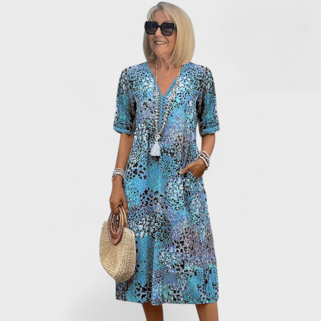 Colette - Vibracijos midi suknelė